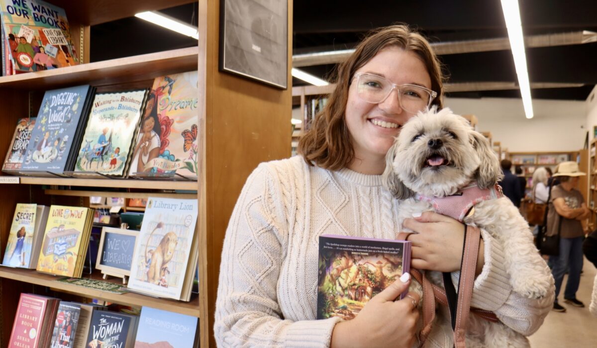 A shopper at the new Library Shop in Mission Hills