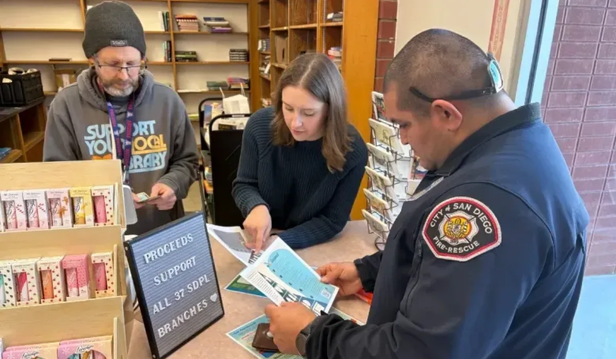 Staff and guests enjoying the new bookstore. (Photo courtesy of Library Foundation SD)