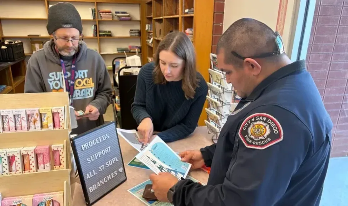 Staff and guests enjoying the new bookstore. (Photo courtesy of Library Foundation SD)